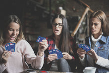 Load image into Gallery viewer, Waddingtons Number 1 WHOT! The Original matching Card Game Age 8+, match the shapes or numbers to get rid of your cards, educational travel game, great gift for players aged 5 plus
